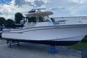 Grady-White Canyon 306 2018 Grady-White Canyon 306 boat on stands, outdoor setting, cloudy sky.