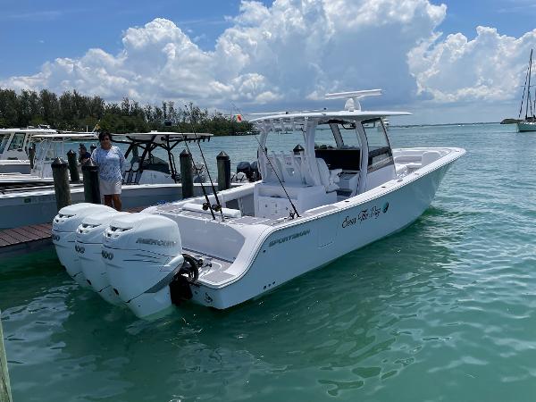 Sportsman Open 352 Center Console 2023 Sportsman Open 352 Center Console boat docked in clear water.