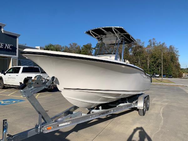 Key West 239 FS 2024 Key West 239 FS boat on a trailer in a parking lot.