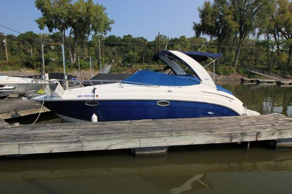 Chaparral 276 Signature Cruiser 2006 Chaparral 276 Signature Cruiser docked on calm water.