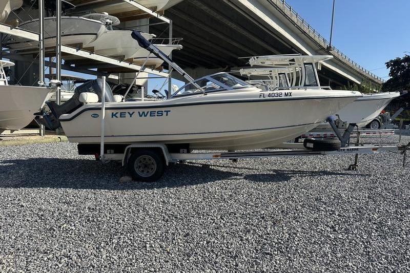 Key West 186 Dual Console 2005 Key West 186 Dual Console boat on trailer under bridge.