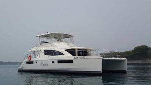 Leopard Leopard 51 2014 Leopard 51 catamaran on calm water, featuring sleek design and spacious deck.