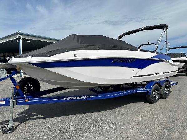Starcraft SVX 211 OB 2024 Starcraft SVX 211 OB boat on trailer, covered and ready for transport.