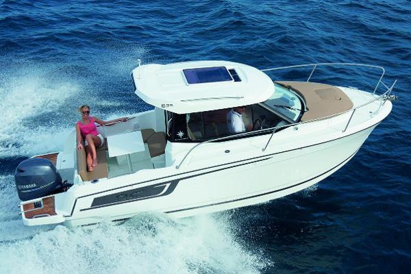 Jeanneau NC 695 Manufacturer Provided Image: 2018 Jeanneau NC 695 boat cruising on the ocean.