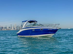 Crownline 264 CR 2020 Crownline 264 CR boat on water with city skyline in background.