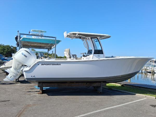 Sportsman Open 252 Center Console 2025 Sportsman Open 252 Center Console boat docked at a marina.