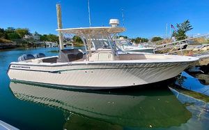 Grady-White Canyon 306 2014 Grady-White Canyon 306 boat docked in a serene marina setting.