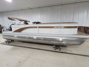 Bennington 23SXL EXP TRI 2023 Bennington 23SXL EXP TRI pontoon boat in storage facility.