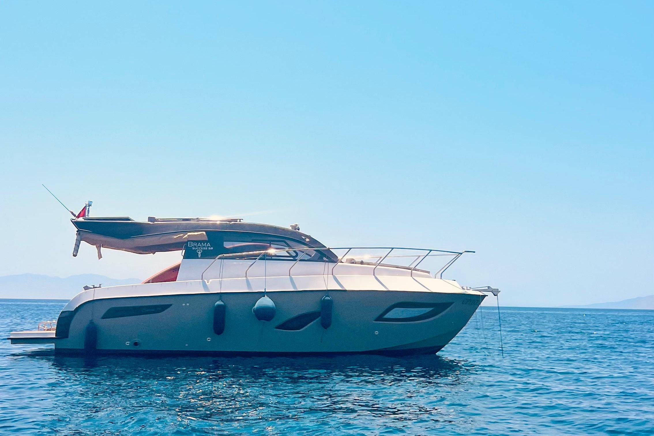 Yanmar Success 35 2023 Yanmar Success 35 yacht on calm blue sea under clear sky.