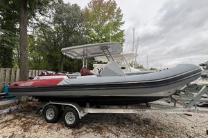 Apex A-24 Apex A-24 boat on trailer, 2025 model, parked outdoors.