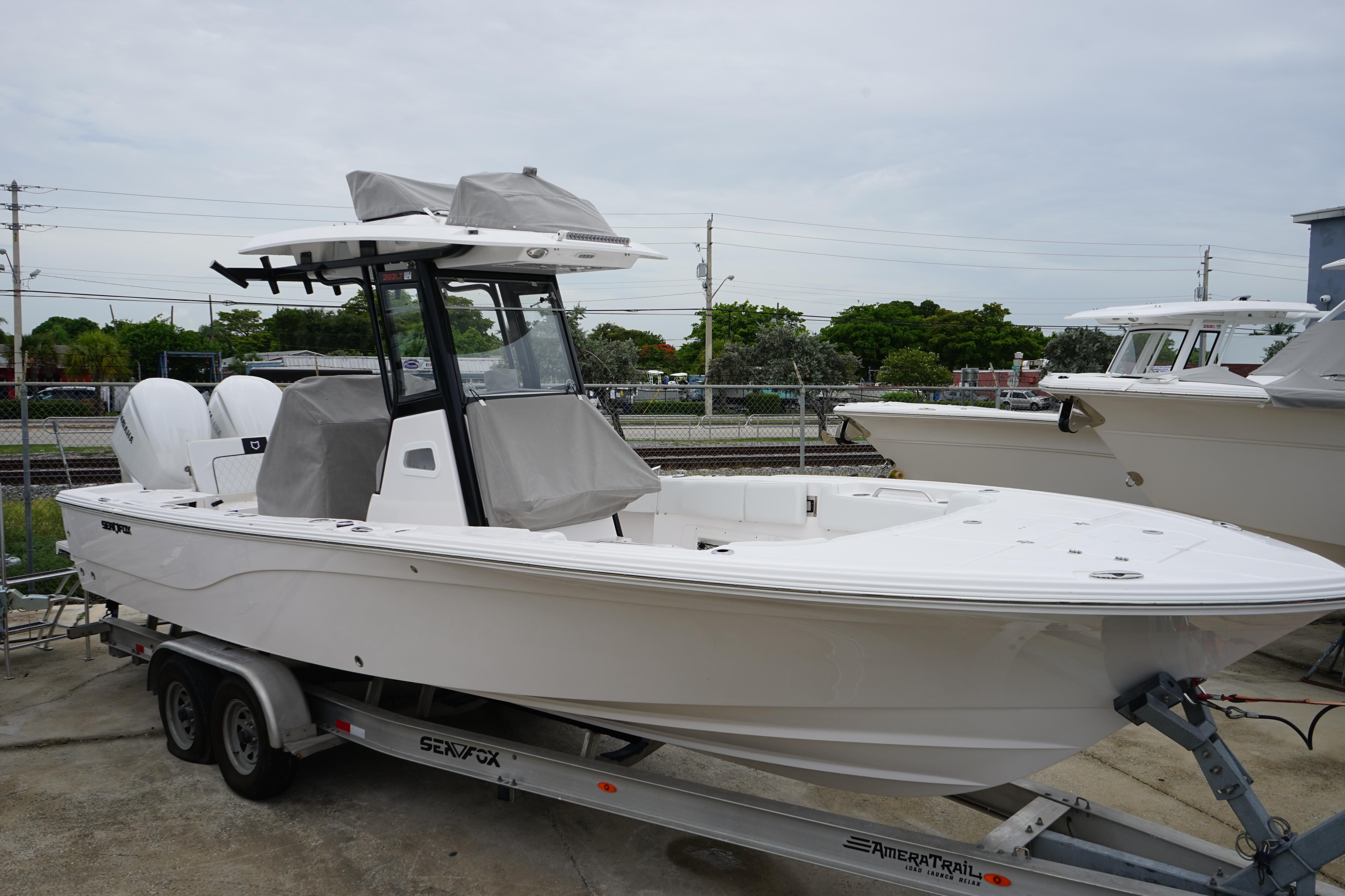 Sea Fox 282 Hybrid LT 2025 Sea Fox 282 Hybrid LT boat on trailer, parked outdoors.