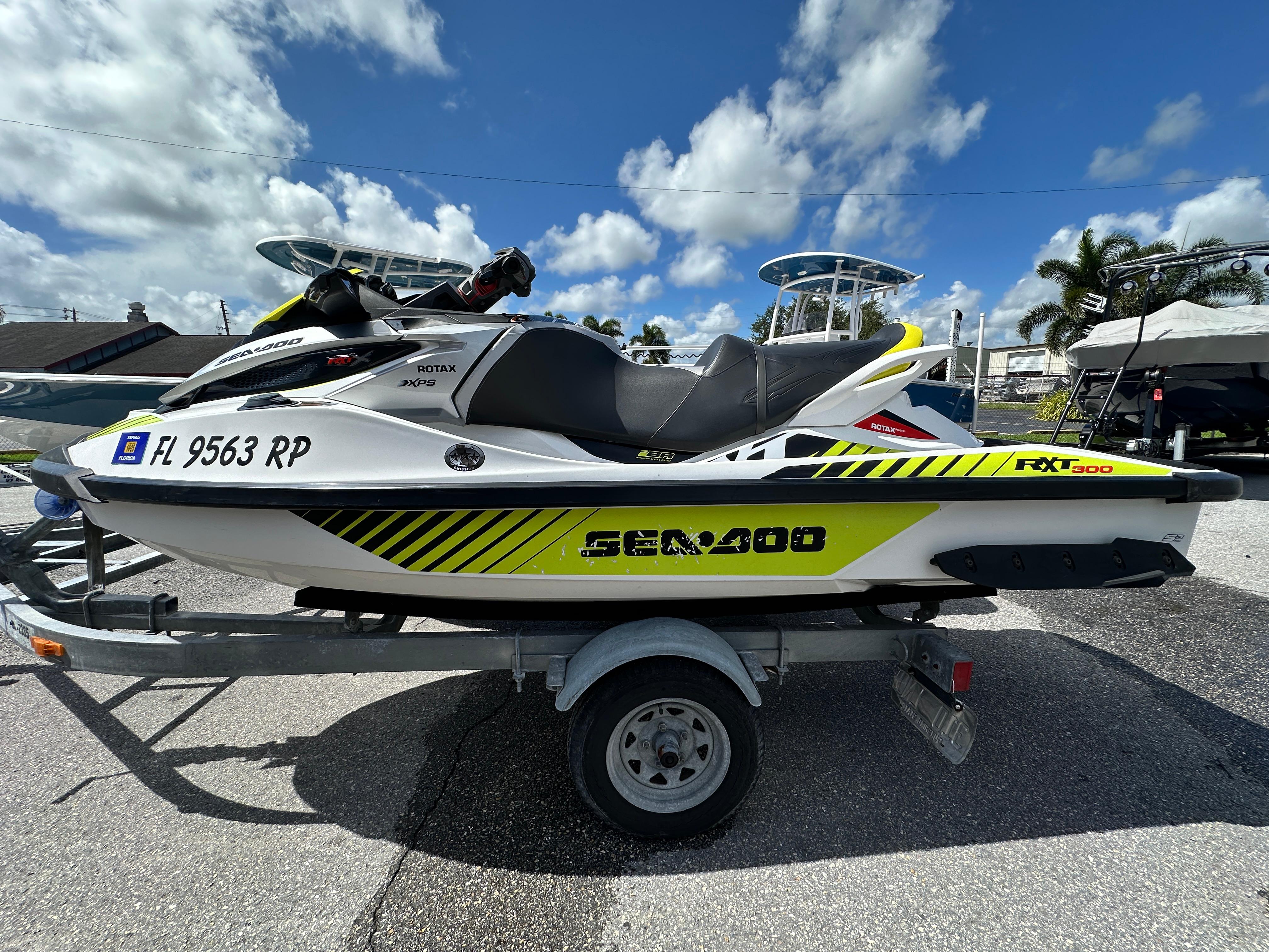 Sea-Doo RXT-X 300 2017 Sea-Doo RXT-X 300 jet ski on trailer under blue sky.