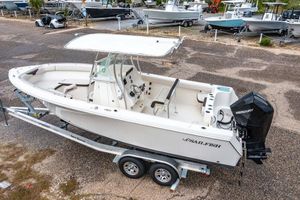 Sailfish 242CC 2022 Sailfish 242CC boat on trailer, featuring a Mercury outboard engine.