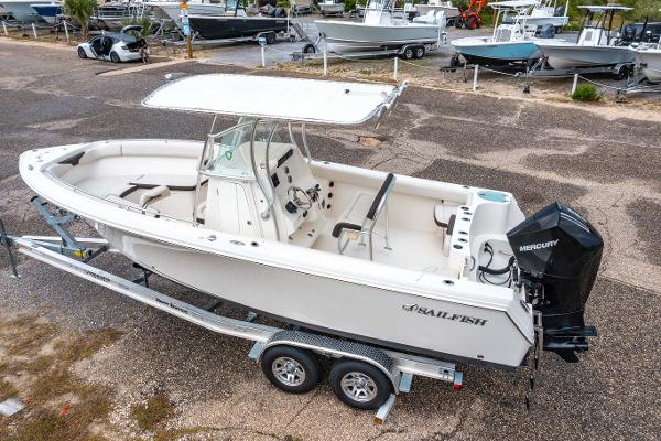 Sailfish 242CC 2022 Sailfish 242CC boat on trailer, featuring a Mercury outboard engine.