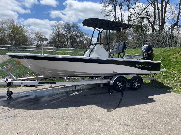 NauticStar 227 Bay 2023 NauticStar 227 Bay boat on a trailer, ready for transport.