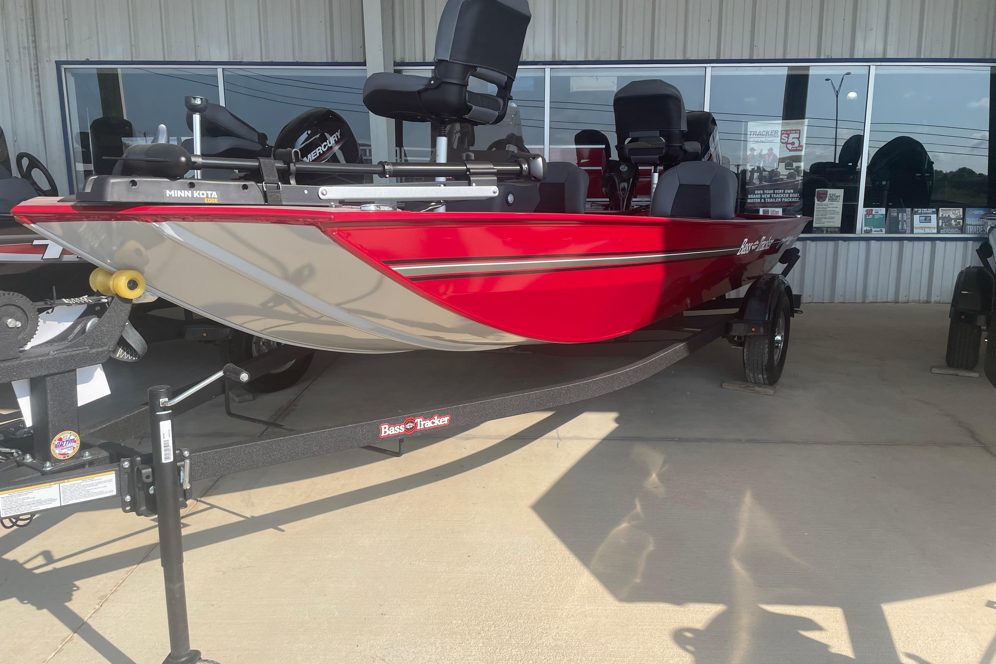 Tracker Bass Tracker Classic XL 2026 Tracker Bass Tracker Classic XL boat in vibrant red on display.
