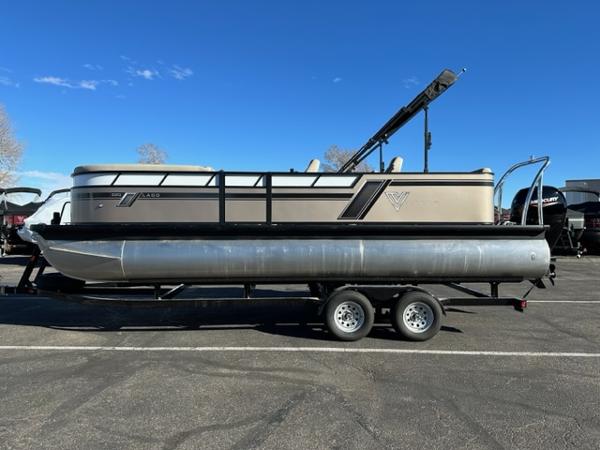 Viaggio Lago Q 2023 Viaggio Lago Q pontoon boat on trailer under clear blue sky.
