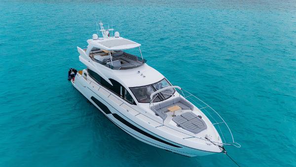 Sunseeker Manhattan 66 2018 Sunseeker Manhattan 66 yacht on clear blue water.