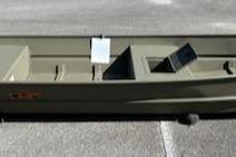 Tracker Grizzly 15 Jon 2026 Tracker Grizzly 15 Jon boat on pavement, showcasing its sleek design and spacious interior.