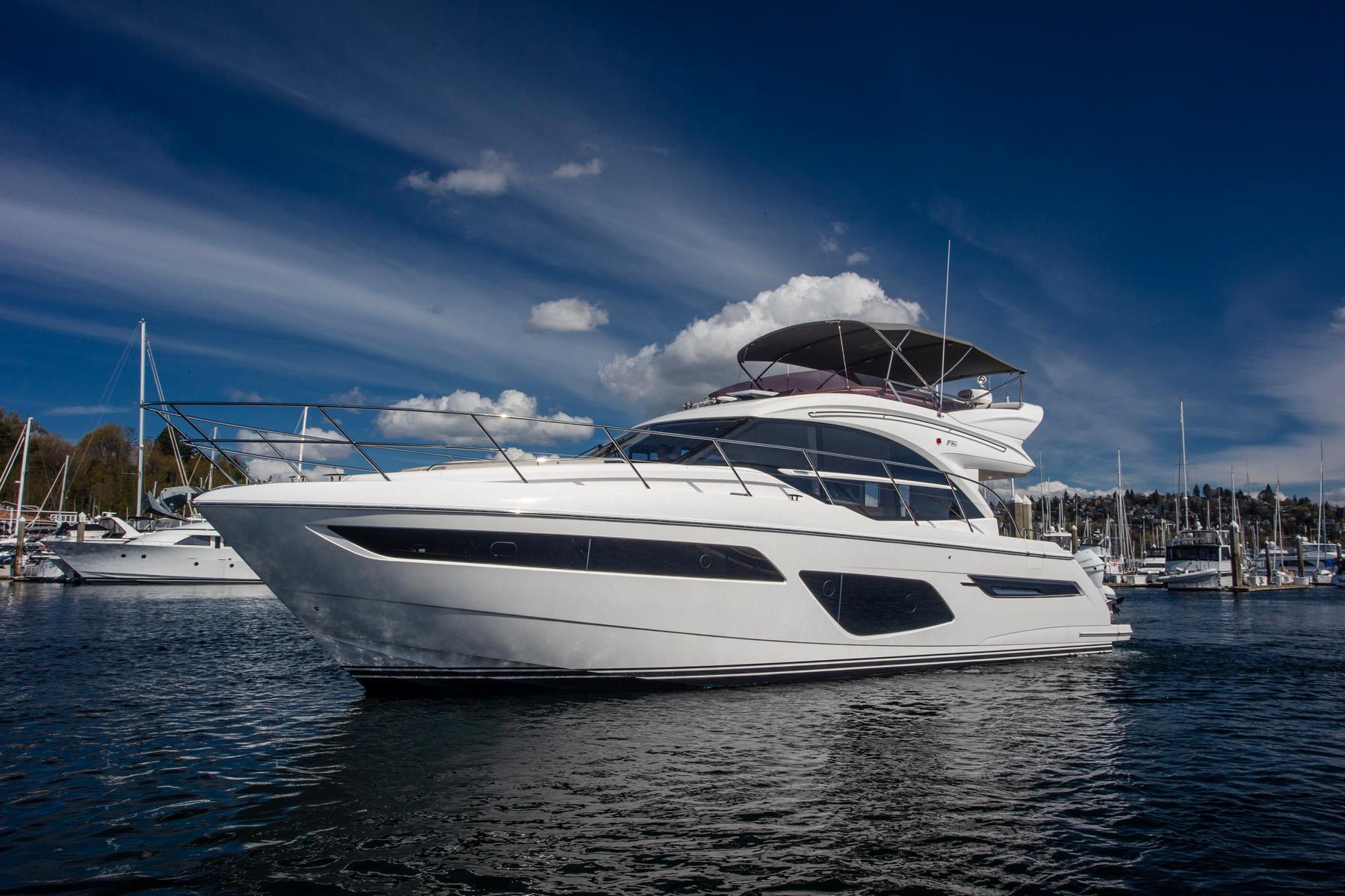 Princess F50 Luxury 2022 Princess F50 yacht docked under a clear blue sky.