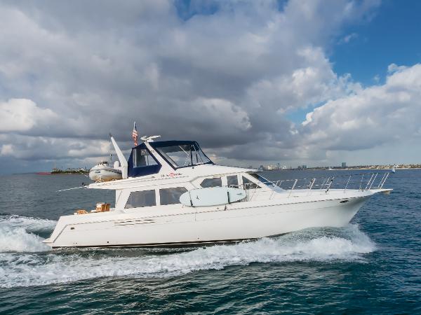 Navigator 53 Classic Navigator 53 Classic yacht cruising on open water under a partly cloudy sky.