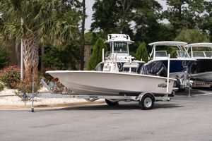 Carolina Skiff EV180 Sea Skiff 2026 Carolina Skiff EV180 Sea Skiff on trailer, parked outdoors near palm trees.