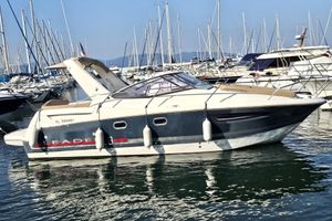 Jeanneau Leader 8 2013 Jeanneau Leader 8 boat docked in marina, surrounded by other yachts.