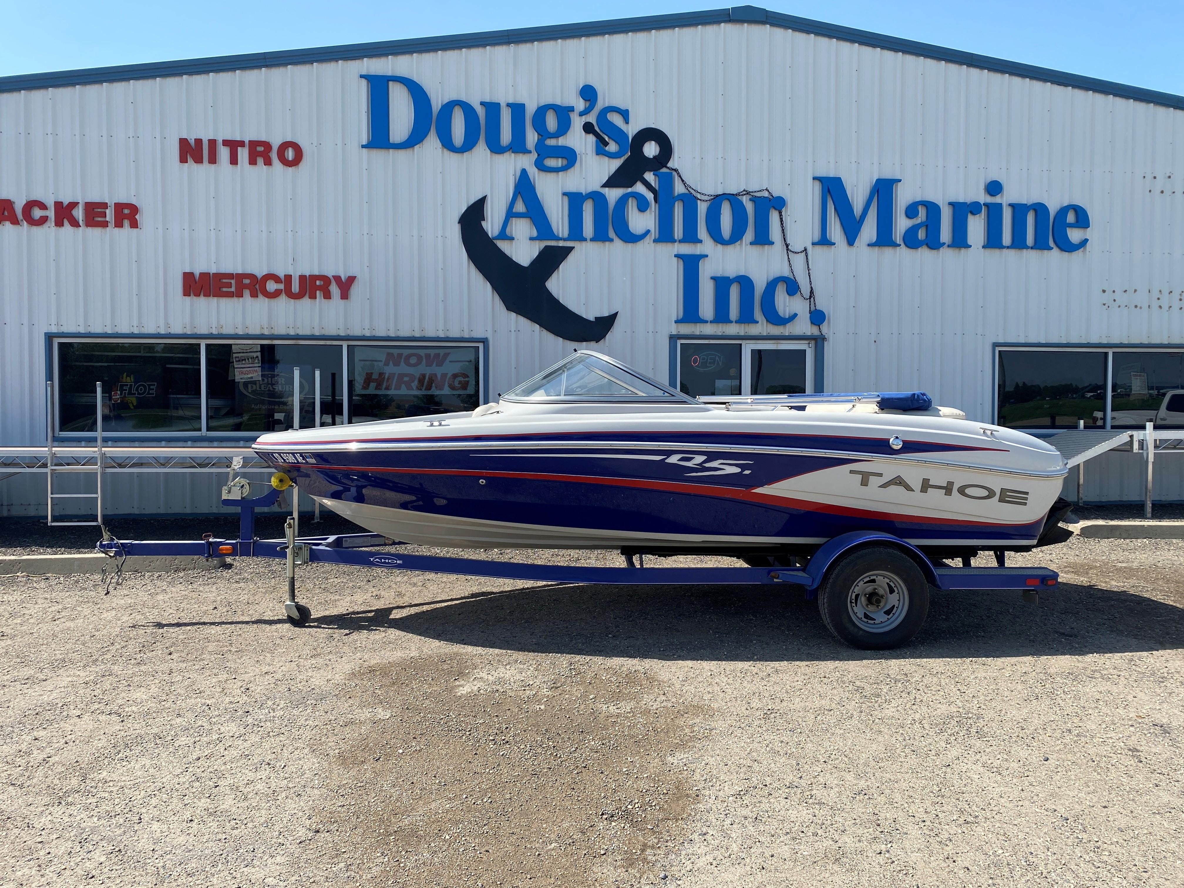Tahoe Q5i 2013 Tahoe Q5i boat on trailer outside Doug's Anchor Marine Inc.