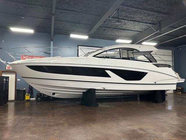 Beneteau Gran Turismo 41 FREE NATION WIDE SHIPPING 2024 Beneteau Gran Turismo 41 yacht displayed indoors, sleek design, modern features.