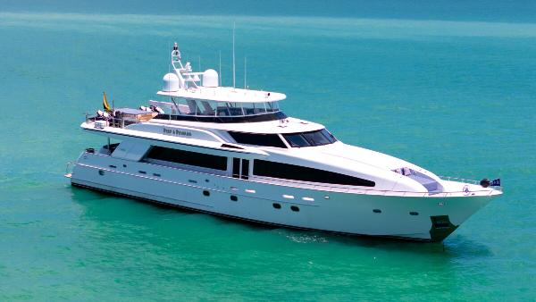 Crescent Raised Pilothouse Luxurious 2004 Crescent Raised Pilothouse yacht cruising on turquoise waters.