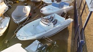 Jeanneau Cap Camarat 6.5CC 2023 Jeanneau Cap Camarat 6.5CC boat displayed in a marina setting.