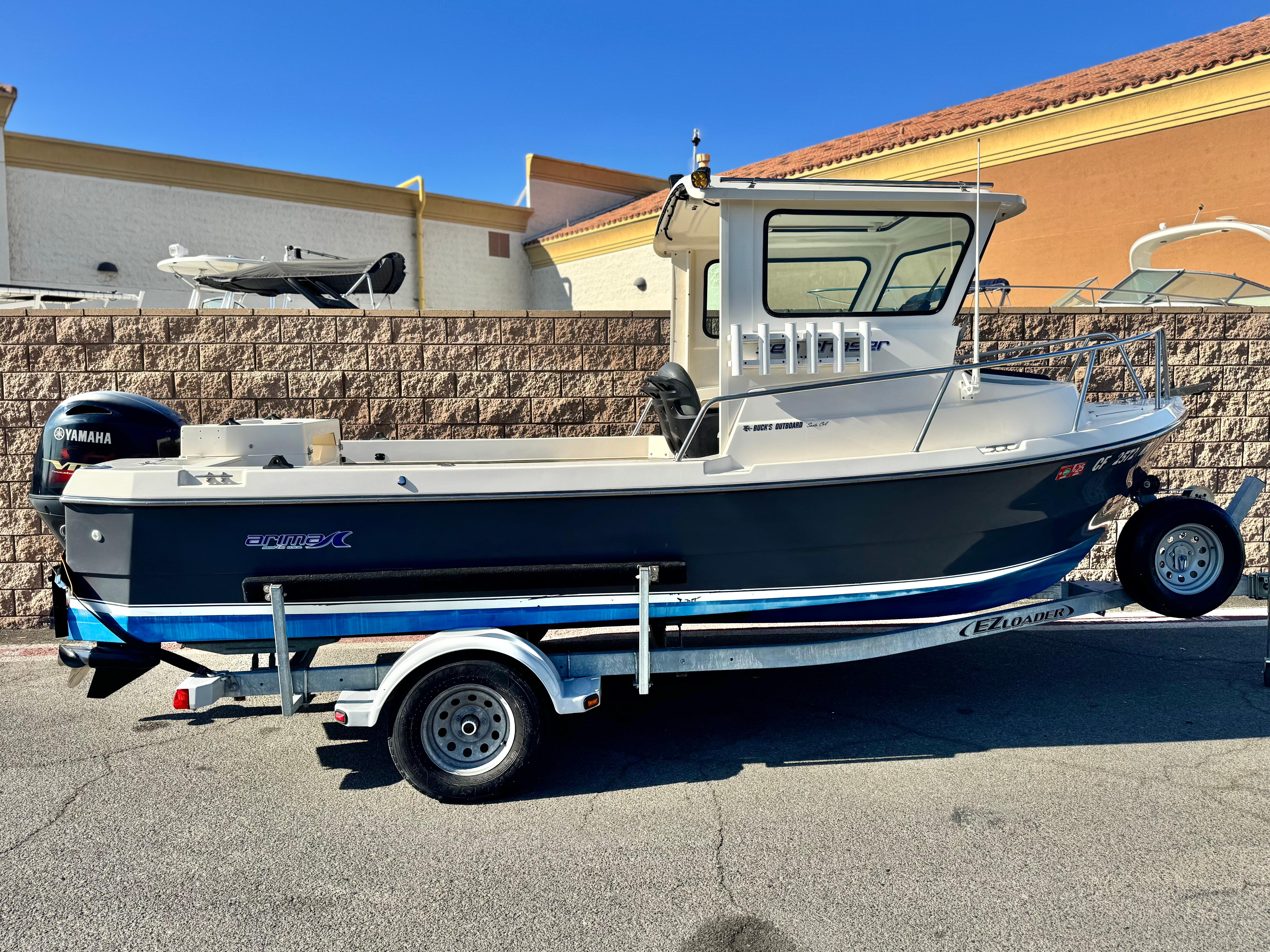 Arima Sea Chaser 19 Yellowtail Edition 2020 Arima Sea Chaser 19 Yellowtail Edition boat on trailer, side view.