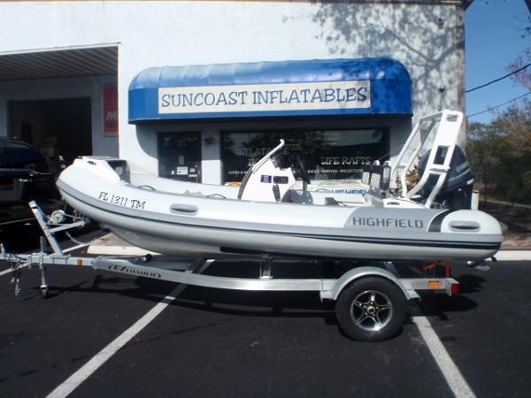 Highfield Sport 420 2023 Highfield Sport 420 inflatable boat on trailer outside Suncoast Inflatables store.