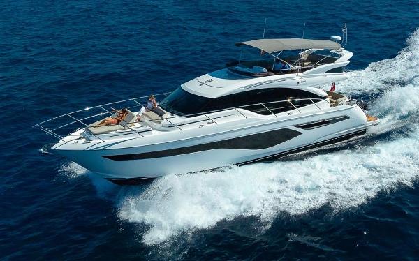 Princess F55 2023 Princess F55 yacht cruising on open sea, showcasing sleek design and luxury features.