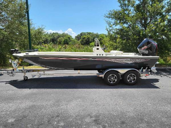 Ranger RB210 2024 Ranger RB210 boat on a trailer, parked outdoors.