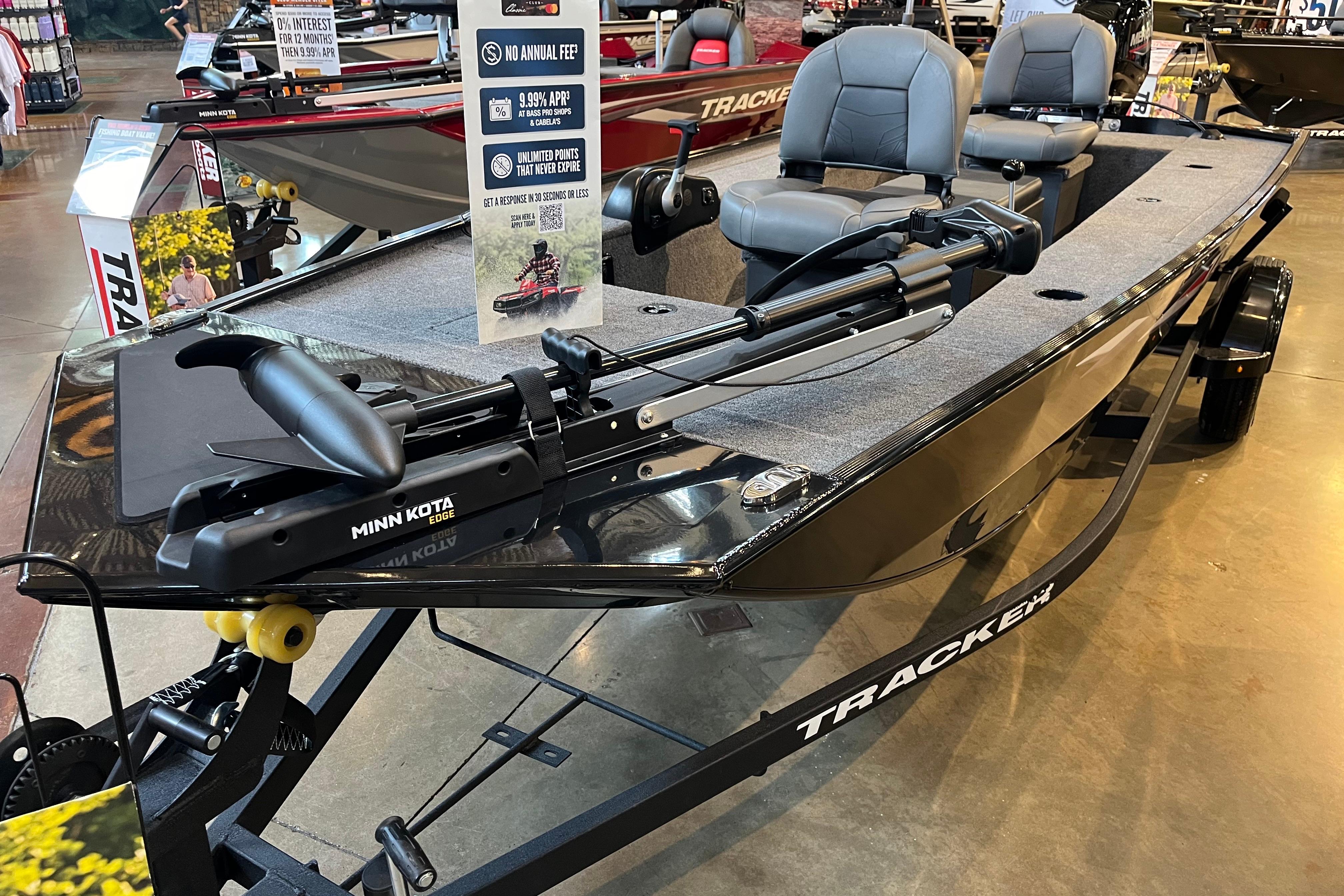 Tracker Panfish 17 2025 Tracker Panfish 17 boat with Minn Kota motor on display in showroom.
