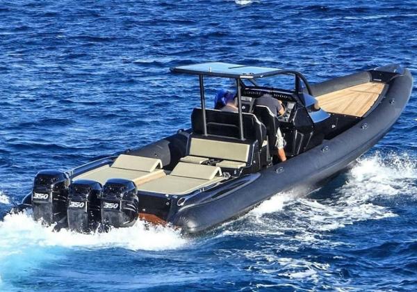 Ribco venom 44 Ribco Venom 44 boat cruising on blue ocean waters, 2017 model with triple 350 engines.