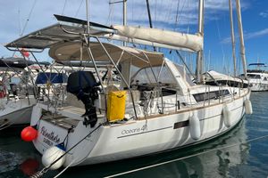 Beneteau Oceanis 41 2013 Beneteau Oceanis 41 sailboat docked in marina, featuring sleek design and modern amenities.