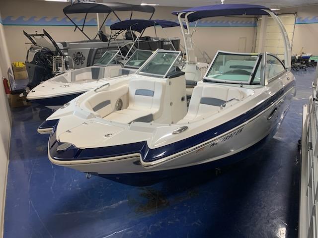 Chaparral 224 Sunesta 2018 Chaparral 224 Sunesta boat with blue accents in showroom.
