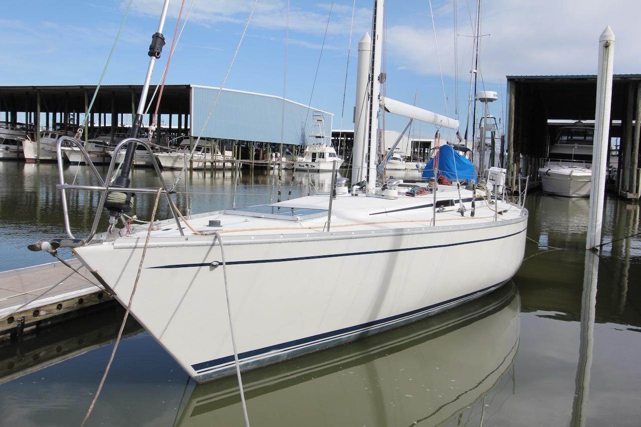 Irwin Citation 41 1982 Irwin Citation 41 sailboat docked at marina, calm water, clear sky.