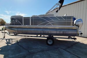 Sylvan Mirage Fish 820 Party Fish 2020 Sylvan Mirage Fish 820 Party Fish pontoon boat on trailer, with Honda outboard motor.