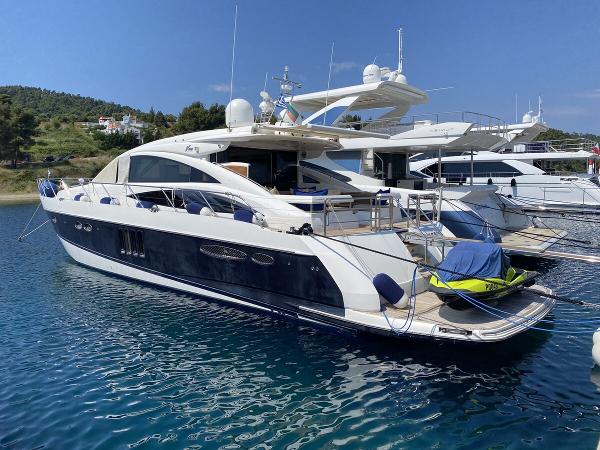 Princess V65 2007 Princess V65 yacht docked in a marina, featuring sleek design and luxurious amenities.