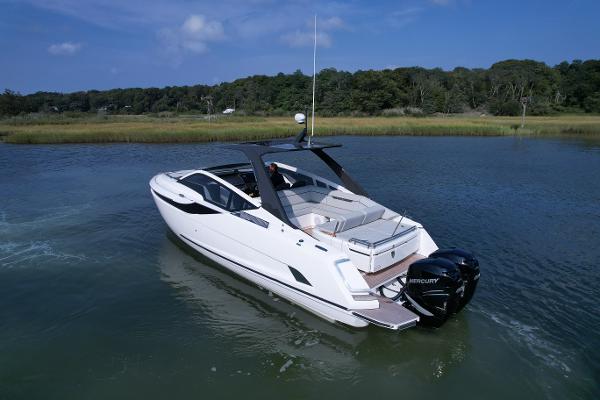 Fairline F//Line 33 Outboard 2023 Fairline F//Line 33 Outboard luxury motor yacht on a serene lake.