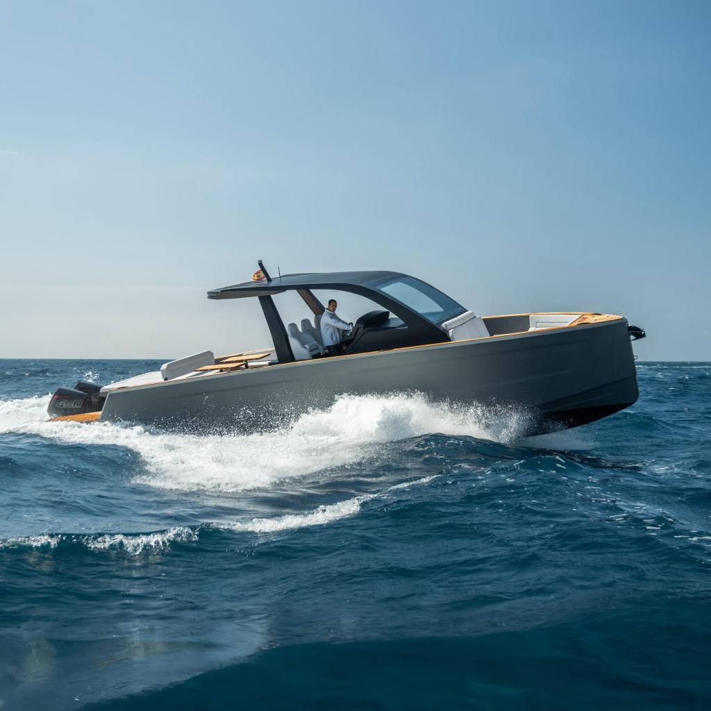 Maxim Yachts 43 Race 2025 Maxim Yachts 43 cruising on open sea under clear blue sky.
