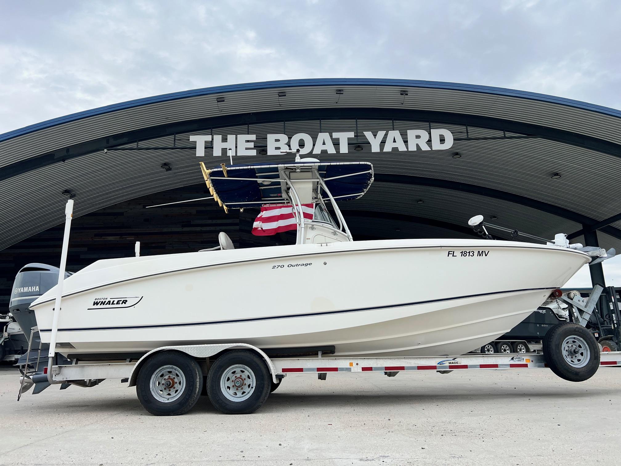 Boston Whaler 270 Outrage 2004 Boston Whaler 270 Outrage boat on trailer at The Boat Yard.