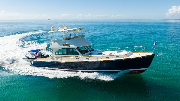 Hinckley Talaria 55 FB 2007 Hinckley Talaria 55 FB yacht cruising on clear blue ocean waters.