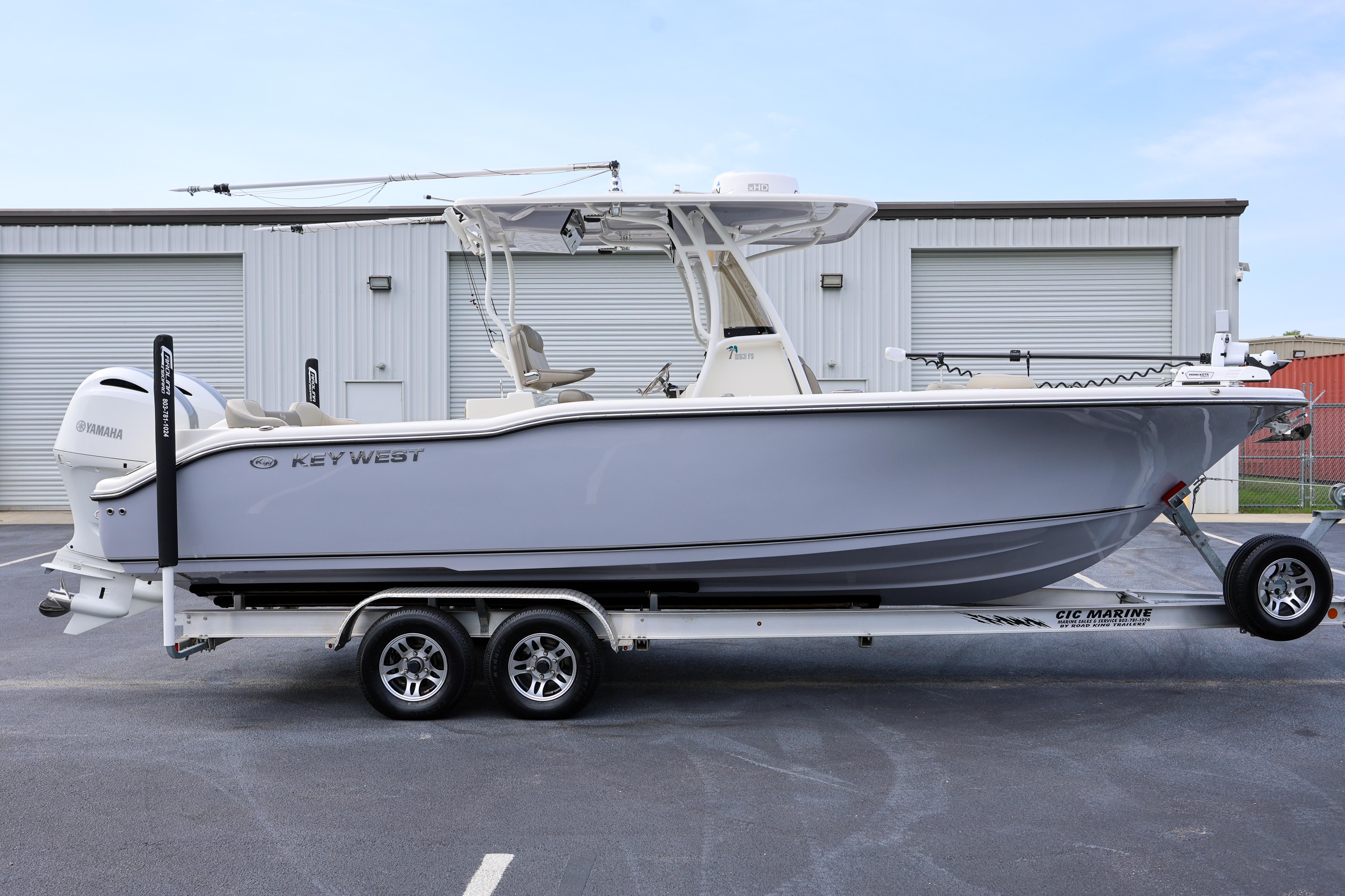 Key West 263 FS 2023 Key West 263 FS boat on trailer, parked outside industrial building.