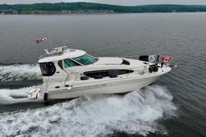 Sea Ray 40 Motor Yacht 2007 Sea Ray 40 Motor Yacht cruising on a lake with Canadian flags.