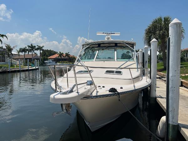 Grady-White Express 360 2006 Grady-White 360 Express boat docked in a sunny marina.