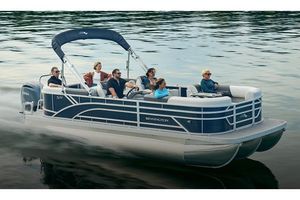 Bennington 22 S-One Quad Bench Manufacturer Provided Image: 2026 Bennington 22 S-One Quad Bench pontoon boat cruising on a calm lake.